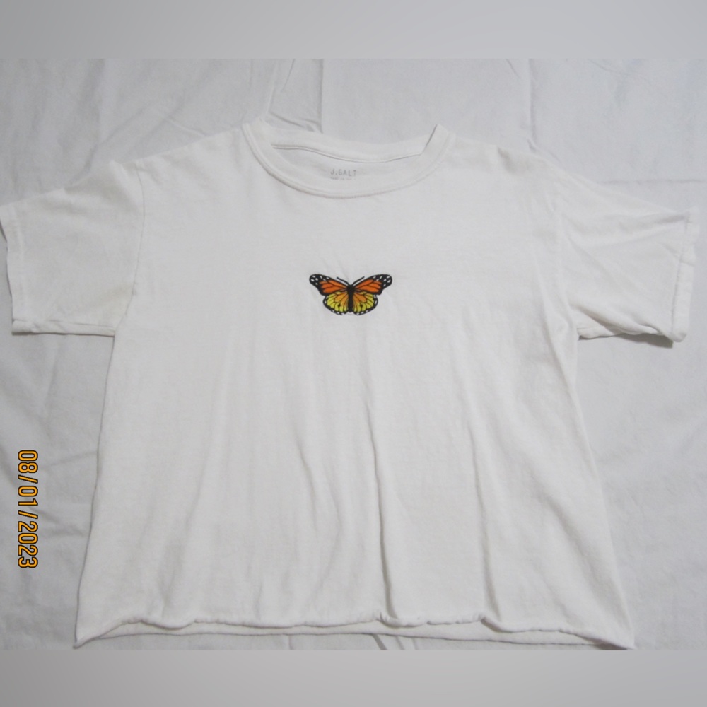 Slightly cropped basic white John Galt t-shirt with an embroidered butterfly